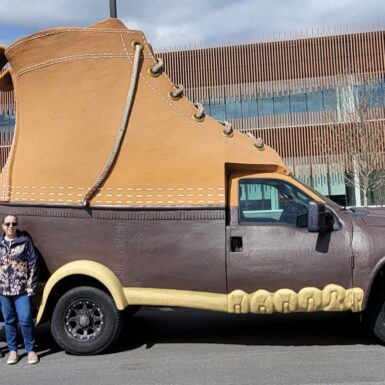 Portland Webworks project managers in front for the LL.Bean Bootmobile.